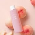 Brightening and hydrating peach essence toner with niacinamide